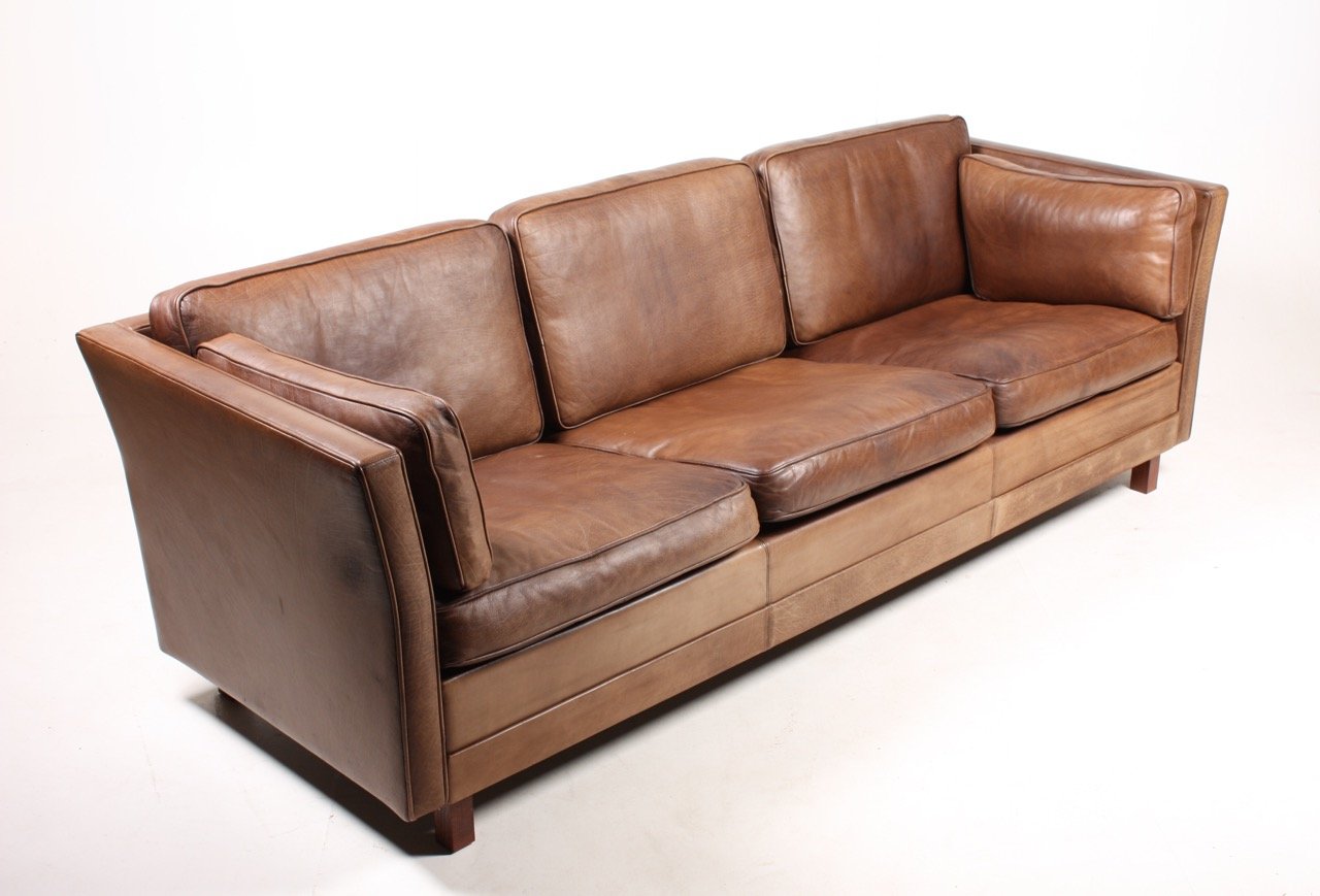 three seater brown leather sofa