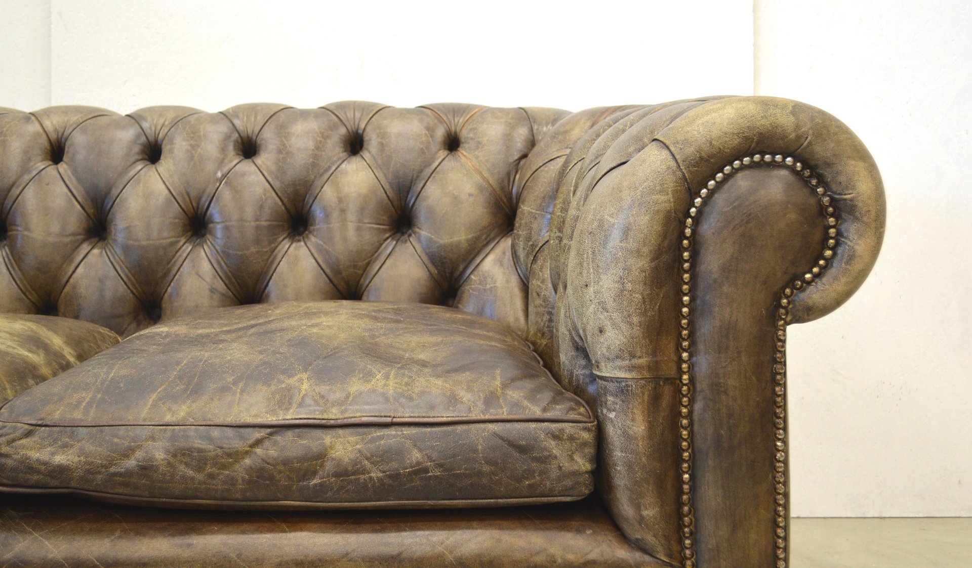 Vintage English Dark Brown Leather Chesterfield Two Seater Sofa