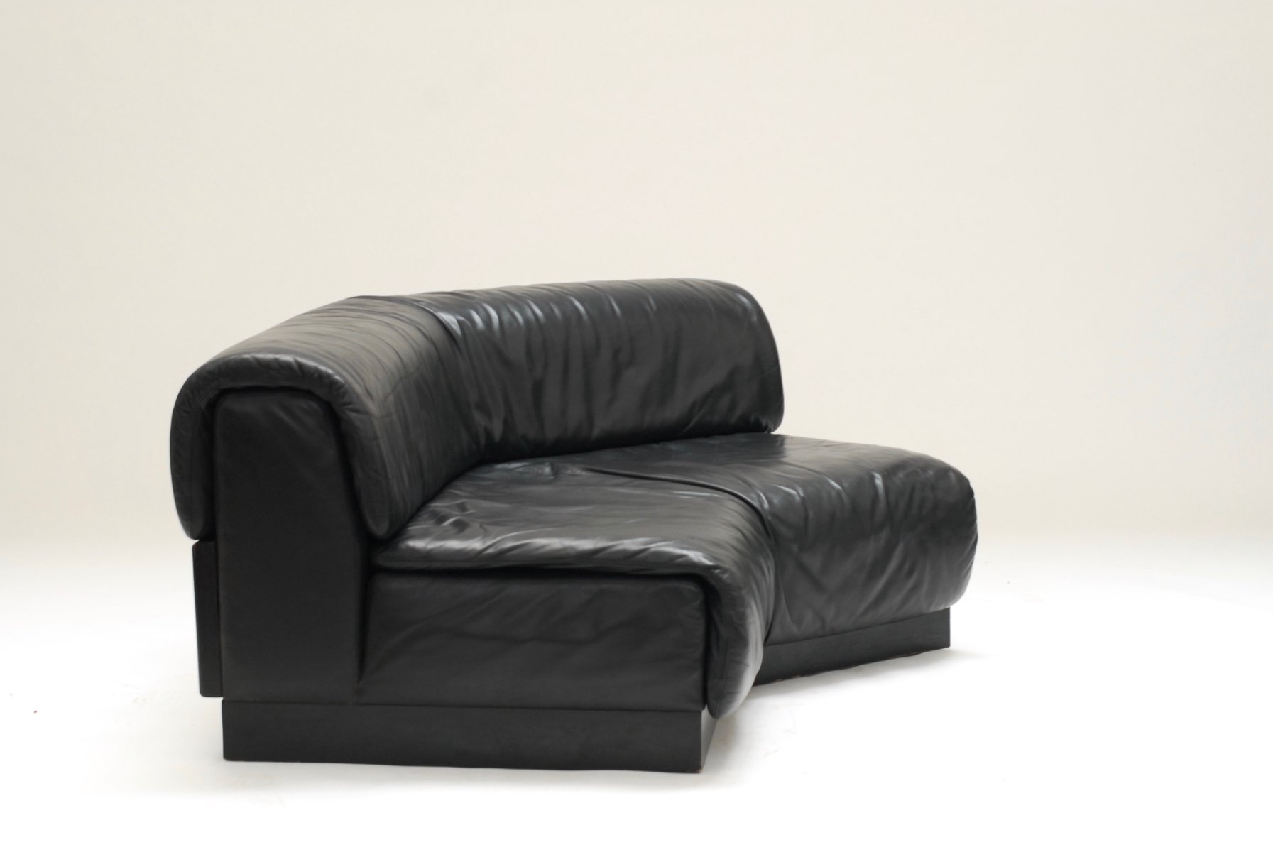 Belgian Curved Low Leather Sofa 1970s for sale at Pamono