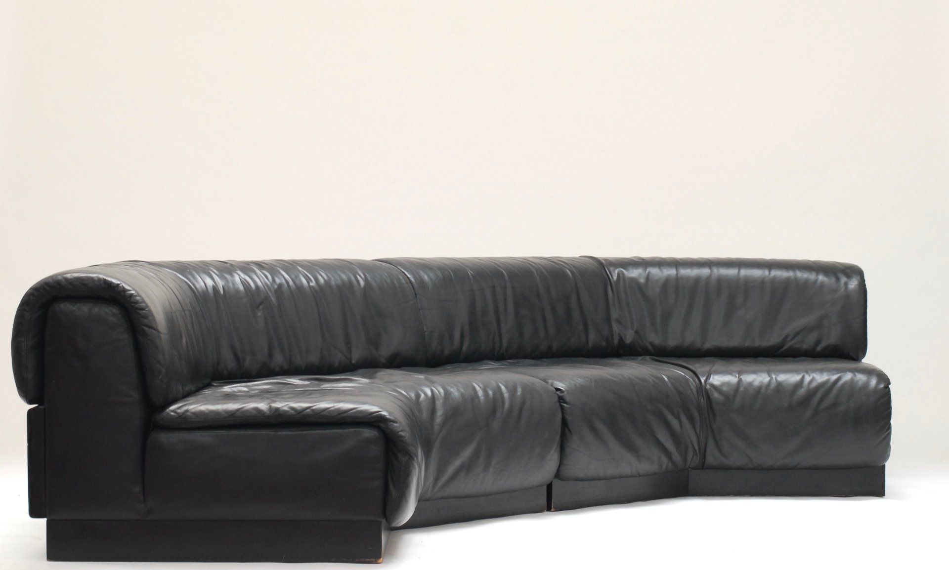 Belgian Curved Low Leather Sofa 1970s for sale at Pamono