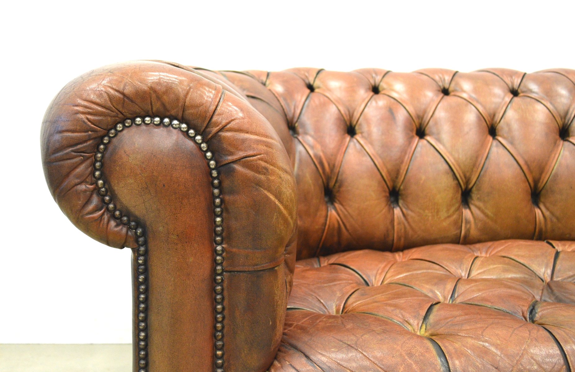 English Art Deco Cognac Leather Chesterfield Two Seater Sofa English Art Deco Cognac Leather Chesterfield Two Seater Sofa