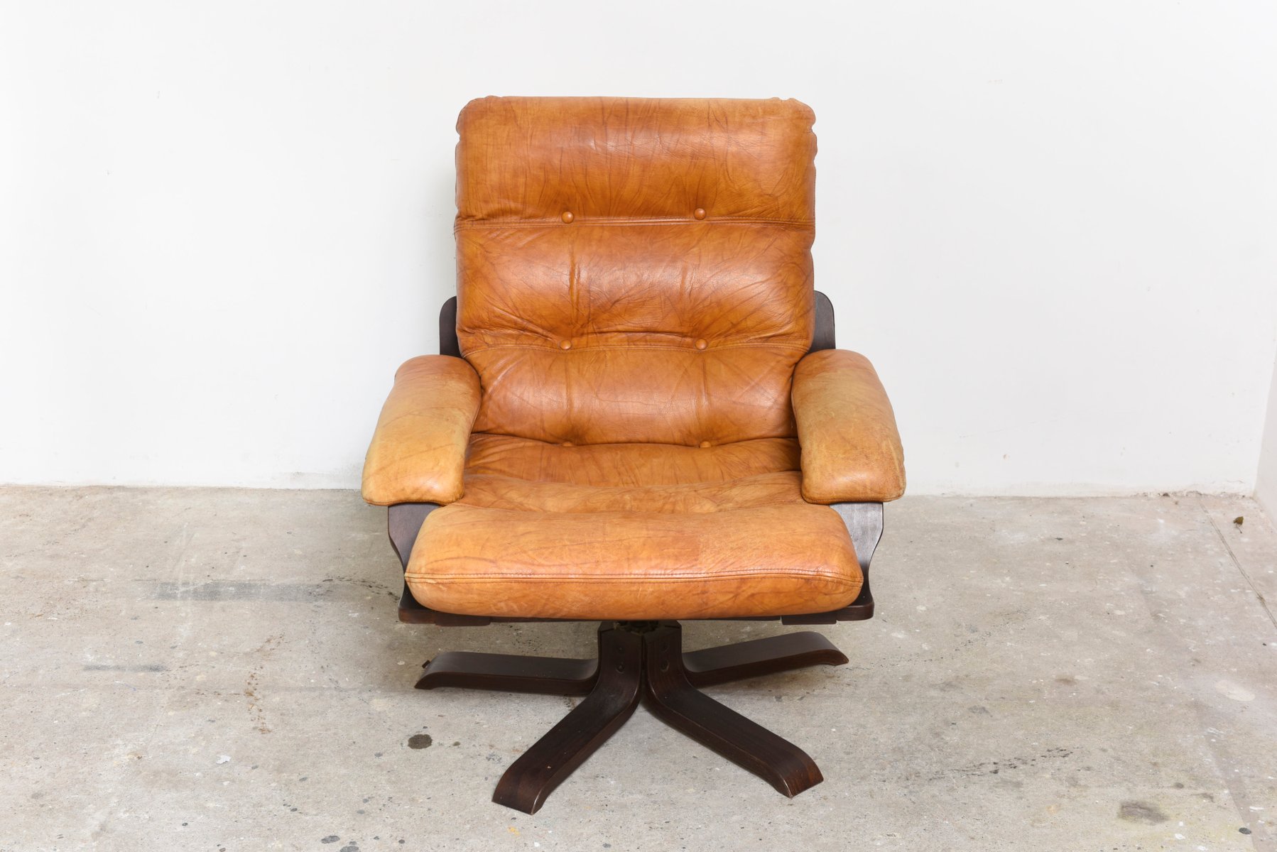 Nordic Cognac Leather Swivel Lounge Chair